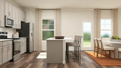 Modern kitchen and open living space in new construction Raleigh NC homes